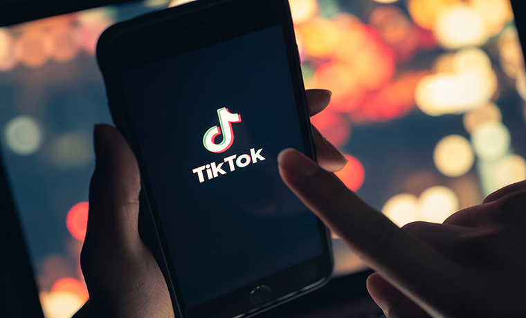 Image of the TikTok logo on an iPhone screen