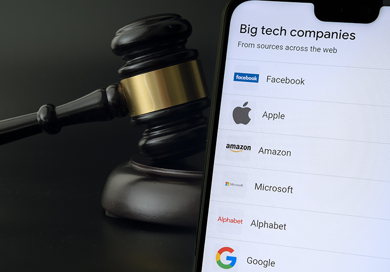 Image of major tech company logos on iPhone with gavel in the background