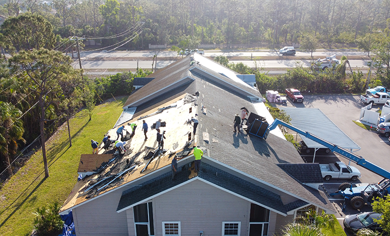 Workers installing a roof in Florida